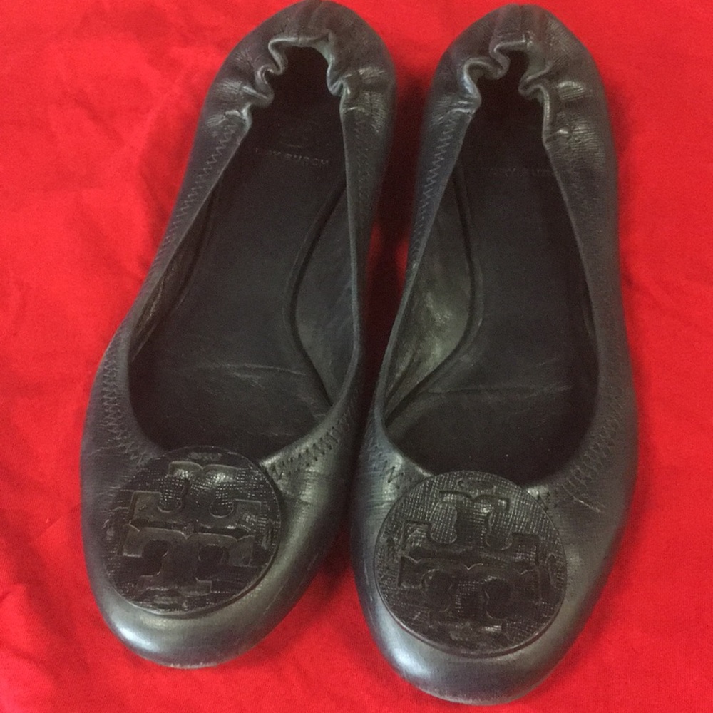 Navy Tory flats.